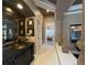 Hallway with decorative elements leading to a bedroom at 7070 Se 14Th Ct, Ocala, FL 34480