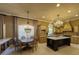 Gourmet kitchen boasts island, custom cabinetry, and high-end appliances at 7070 Se 14Th Ct, Ocala, FL 34480