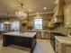 Gourmet kitchen with large island and high-end appliances at 7070 Se 14Th Ct, Ocala, FL 34480