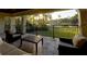 Relaxing patio with golf course views and comfortable seating at 7070 Se 14Th Ct, Ocala, FL 34480