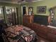 Spacious bedroom with ample closet space and a TV at 3824 Ne 17Th Street Cir, Ocala, FL 34470