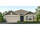 Two-story house with gray siding and a brown roof at 8784 Sw 48Th Ave, Ocala, FL 34476
