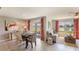 Bright dining area with water view and access to patio at 8784 Sw 48Th Ave, Ocala, FL 34476