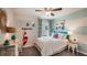 Bedroom with coastal decor and window overlooking backyard at 8784 Sw 48Th Ave, Ocala, FL 34476