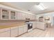 Eat-in kitchen with ample cabinetry and appliances at 17855 Se 99Th Ave, Summerfield, FL 34491