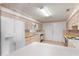 Bright kitchen features ample cabinetry, and a spacious island at 17855 Se 99Th Ave, Summerfield, FL 34491