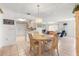 Dining area with table and chairs near kitchen at 17855 Se 99Th Ave, Summerfield, FL 34491