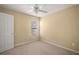 Bedroom with ceiling fan and window at 4415 Sw 52Nd Cir # 101, Ocala, FL 34474