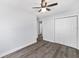 Spacious bedroom with ceiling fan and laminate flooring at 729 Se 32Nd Ave, Ocala, FL 34471