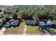 Aerial view of single-story house with large yard, located in a quiet residential neighborhood at 78 Hemlock Dr, Ocala, FL 34472