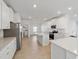 Bright kitchen featuring a large island and stainless steel appliances at 7930 Sw 74Th Loop, Ocala, FL 34481