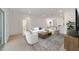 Open living space with a view into the kitchen and hallway at 7930 Sw 74Th Loop, Ocala, FL 34481