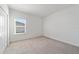 Bright bedroom with neutral carpeting and double door closet at 7930 Sw 74Th Loop, Ocala, FL 34481