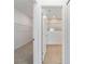 Walk-in closet and bathroom with tile flooring at 7930 Sw 74Th Loop, Ocala, FL 34481
