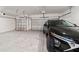 Spacious two-car garage with epoxy flooring at 7930 Sw 74Th Loop, Ocala, FL 34481