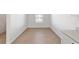 Bright dining area with wood-look tile flooring at 7930 Sw 74Th Loop, Ocala, FL 34481