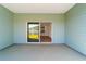 Spacious screened porch with sliding glass doors leading to backyard at 7930 Sw 74Th Loop, Ocala, FL 34481
