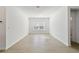Spacious dining area with wood-look tile flooring and natural light at 7930 Sw 74Th Loop, Ocala, FL 34481