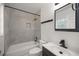 Updated bathroom with new vanity and tile shower/tub combo at 9554 Bahia Rd, Ocala, FL 34472