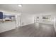 Eat-in kitchen with blue cabinets, stainless steel appliances, and wood countertops at 9554 Bahia Rd, Ocala, FL 34472
