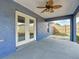 Covered patio with French doors leading to backyard at 17 Locust Lane Ter, Ocala, FL 34472