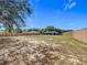 Fenced backyard with large grassy area at 17 Locust Lane Ter, Ocala, FL 34472