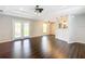 Bright living room, hardwood floors, and access to backyard at 17 Locust Lane Ter, Ocala, FL 34472