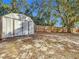 Metal storage shed in backyard, near fenced area at 17 Locust Lane Ter, Ocala, FL 34472