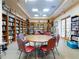 Community library with a large selection of books and comfortable seating at 27018 Nature View St, Leesburg, FL 34748