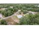 Aerial view showing the house's location on a quiet street at 30 Maple Crse, Ocklawaha, FL 32179