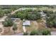 Aerial view of the house and surrounding neighborhood at 30 Maple Crse, Ocklawaha, FL 32179