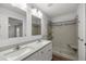 Bathroom with double vanity and shower at 30 Maple Crse, Ocklawaha, FL 32179