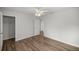 Bedroom with wood-look floors and closet at 30 Maple Crse, Ocklawaha, FL 32179