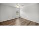 Bright bedroom with wood-look floors at 30 Maple Crse, Ocklawaha, FL 32179