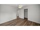 Bright bedroom with wood-look floors and a spacious closet at 30 Maple Crse, Ocklawaha, FL 32179