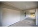 White garage door and covered porch at 30 Maple Crse, Ocklawaha, FL 32179
