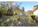 Large backyard with a hammock and garden area at 5336 Sw 109Th Place Rd, Ocala, FL 34476