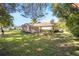 Spacious backyard with lush greenery and a hammock at 5336 Sw 109Th Place Rd, Ocala, FL 34476