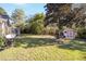 Large backyard with shed and screened patio at 5336 Sw 109Th Place Rd, Ocala, FL 34476