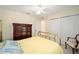 Bedroom with brass bed frame and a dresser at 5336 Sw 109Th Place Rd, Ocala, FL 34476