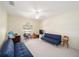 Bright bedroom with two sofas, a TV, and toys at 5336 Sw 109Th Place Rd, Ocala, FL 34476