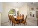 Bright dining room with a large wood table and chandelier at 5336 Sw 109Th Place Rd, Ocala, FL 34476