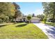 Single-story house with a well-maintained lawn and a two-car garage at 5336 Sw 109Th Place Rd, Ocala, FL 34476