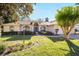 Single story home with a well manicured lawn at 5336 Sw 109Th Place Rd, Ocala, FL 34476