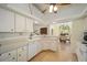 Kitchen features stainless steel appliances and white cabinets at 5336 Sw 109Th Place Rd, Ocala, FL 34476