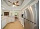 Kitchen with stainless steel appliances and light wood cabinets at 5336 Sw 109Th Place Rd, Ocala, FL 34476