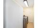 Laundry room with washer, dryer, and extra storage at 5336 Sw 109Th Place Rd, Ocala, FL 34476