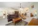 Bright and airy living room with a view of the kitchen and entry at 5336 Sw 109Th Place Rd, Ocala, FL 34476