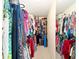 Large walk-in closet with ample hanging space and shelving at 5336 Sw 109Th Place Rd, Ocala, FL 34476