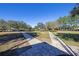 Paved walking paths through a grassy park area at 5564 Sw 90Th Ave, Ocala, FL 34481